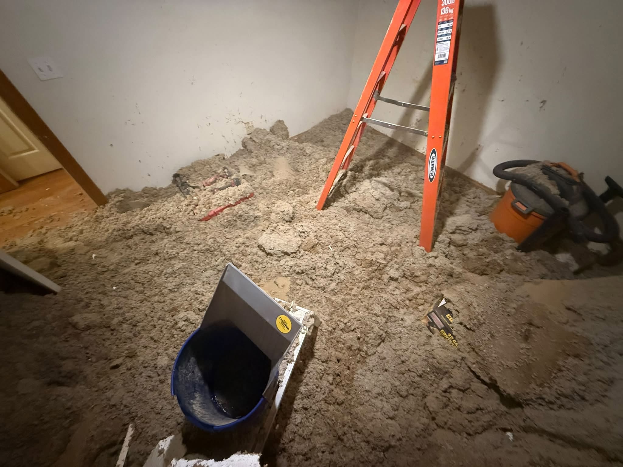 Interior floor removed down to the subfloor during a remodeling project